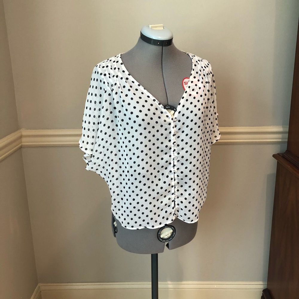White & black polka dot blouse
